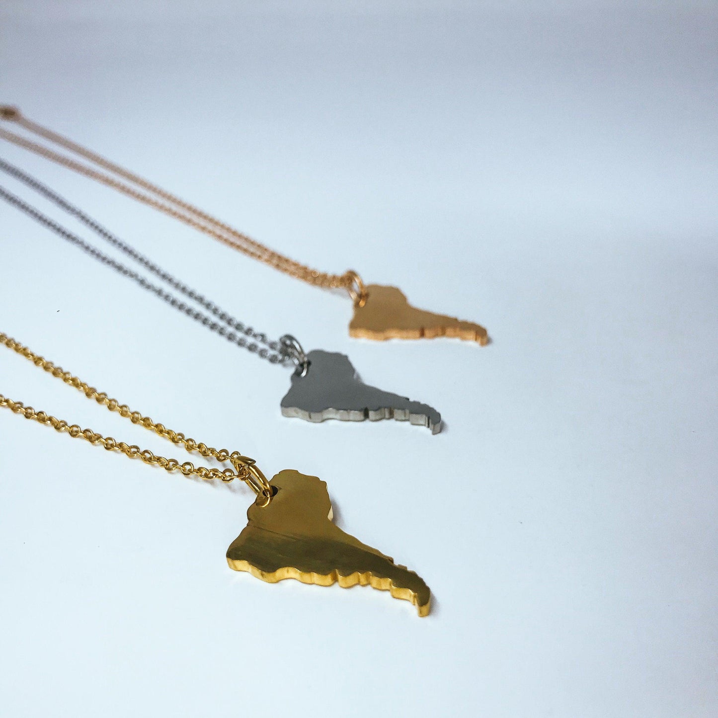 South America Silhouette Necklaces in 3 different colors: Gold, Silver & Rose Gold
