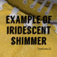 sign that says "example of shimmer" with an up close photo of yellow glitter fabric