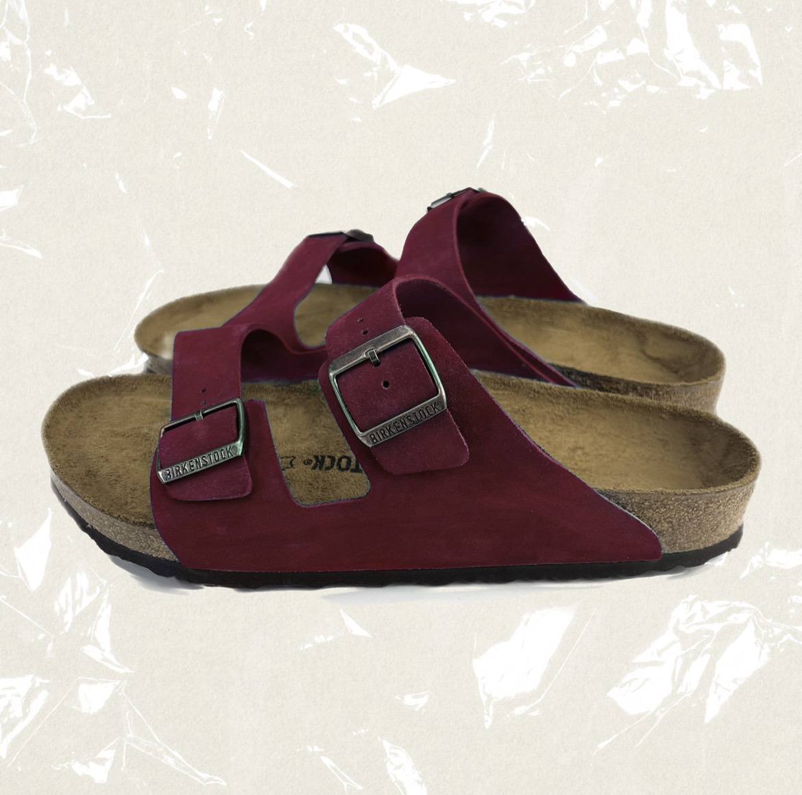 side view of burgundy Birkenstock sandals 