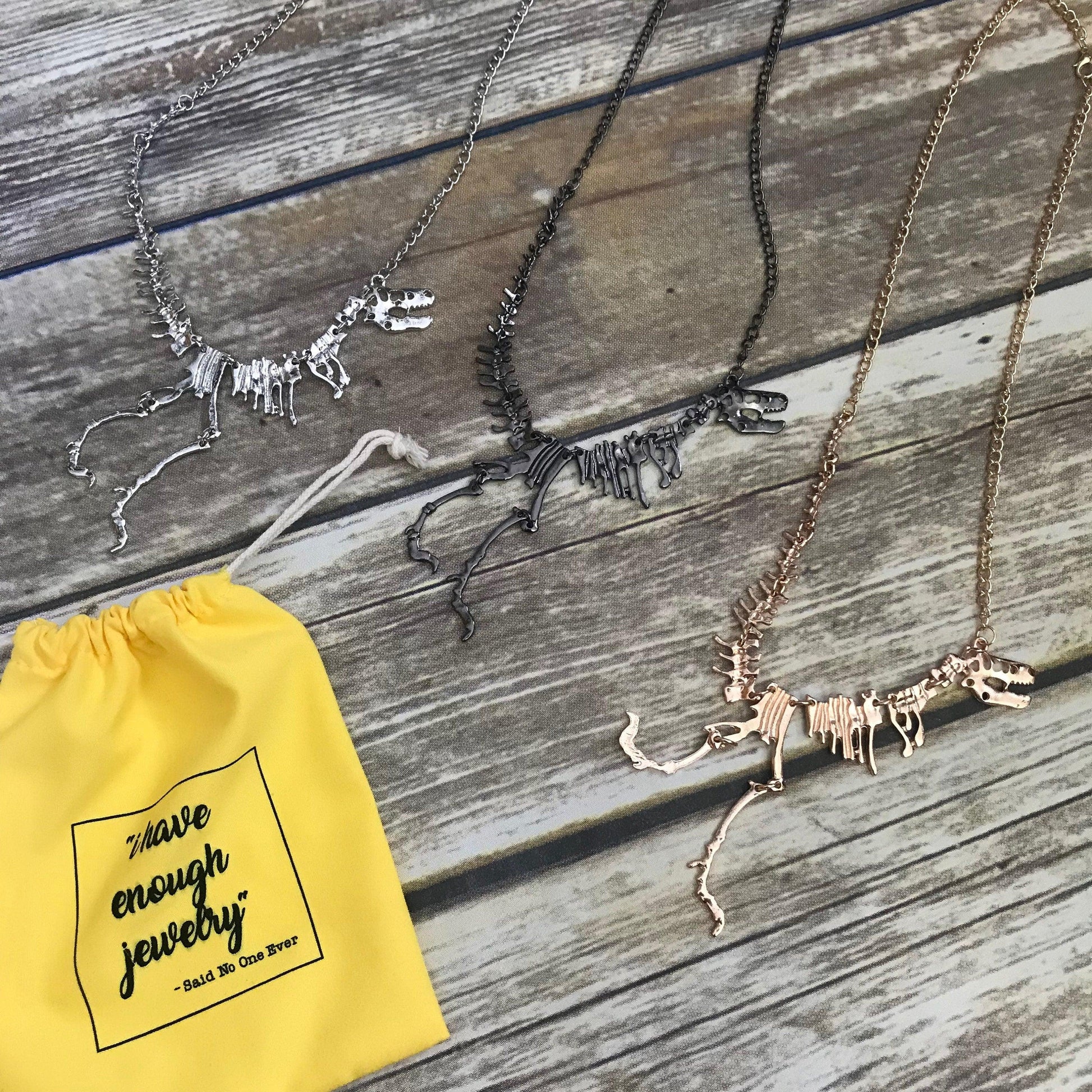 T-Rex Dinosaur Bones Necklaces in 3 different colors: Gold, Silver & Gunmetal