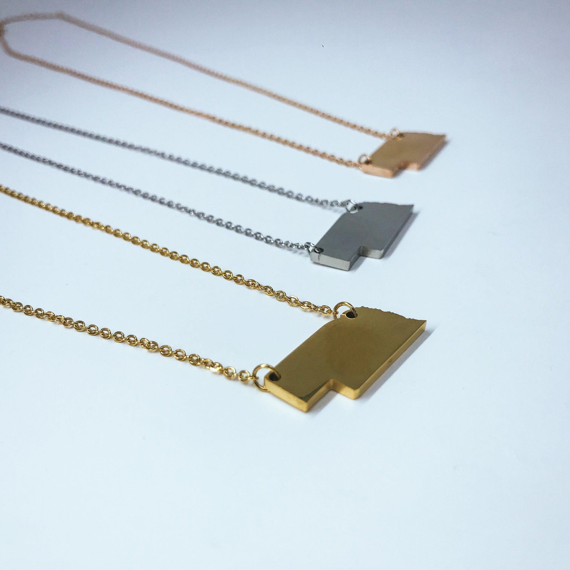 Nebraska State Silhouette Necklaces in 3 different colors: Gold, Silver & Rose Gold
