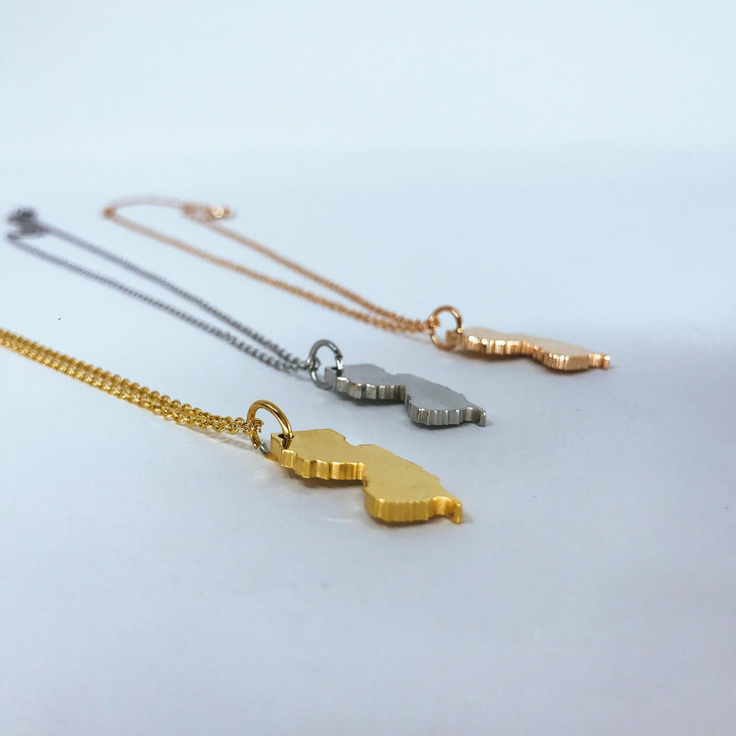 New Jersey State Silhouette Necklaces in 3 different colors: Gold, Silver & Rose Gold
